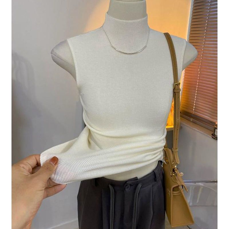 StillSerene™ Sweater vest for women comes in white, black pink & khaki beige. Turtleneck sweater vest